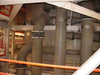 FGD scrubber FRP piping protected from lime slurry erosion at coal-fired power plant — Belzona KHIA