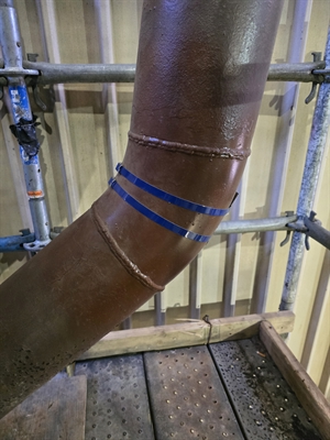 Fly ash elbow holed in months — wrapped for good — Belzona KHIA